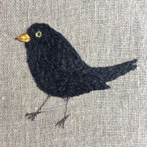 Sarah becvar design freehand machine embroidered blackbird hoop