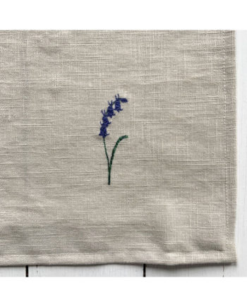 freehand machine embroidered violet flower stem embroidered by Sarah Becvar flower art embroidery linen napkin forget me not