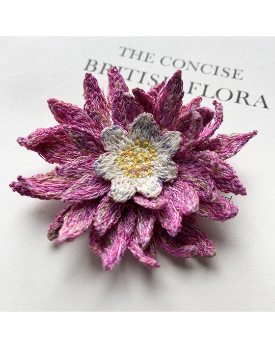 Dahlia flower brooch made entirely from freehand machine embroidery and stitched by Sarah Becvar