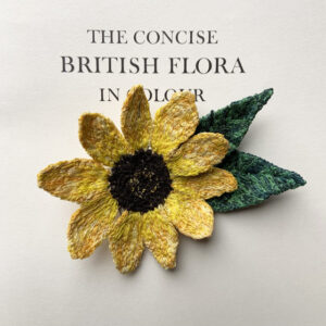 sunflower brooch made entirely from freehand machine embroidery and stitched by Sarah Becvar