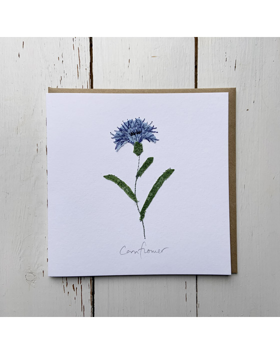 a wildflower notecard stitched directly onto a card blank using free motion machine embroidery and appliqué stitched by textile artist Sarah Becvar