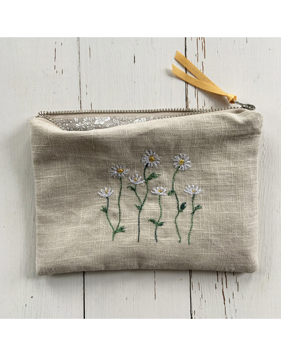 freehand machine embroidered linen pouch embroidered with wild flowers and stitched by textile artist sarah becvar