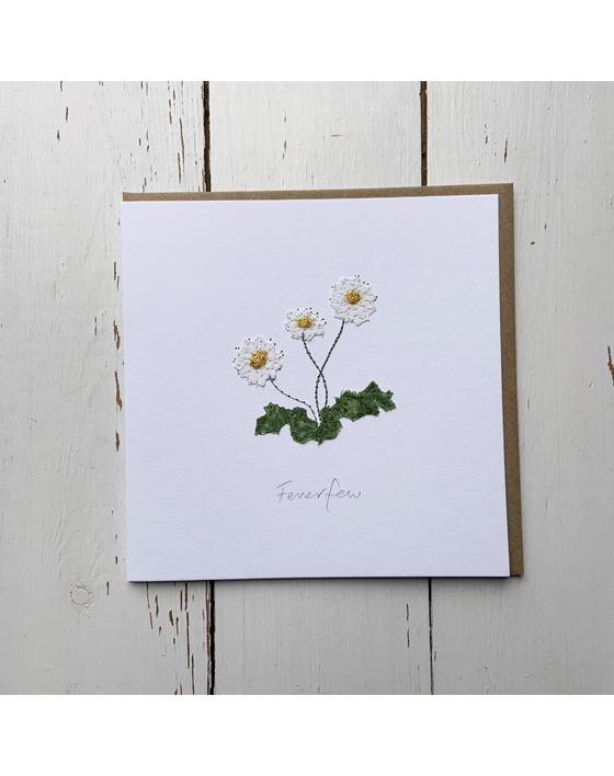 a wildflower notecard stitched directly onto a card blank using free motion machine embroidery and appliqué stitched by textile artist Sarah Becvar