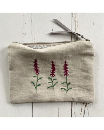 freehand machine embroidered linen pouch embroidered with wild flowers and stitched by textile artist sarah becvar