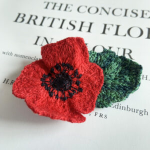 embroidered red poppy textile art thread embroidery Sarah Becvar freehand machine embroidered remembrance poppy brooch