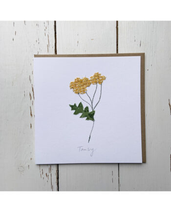 a wildflower notecard stitched directly onto a card blank using free motion machine embroidery and appliqué stitched by textile artist Sarah Becvar