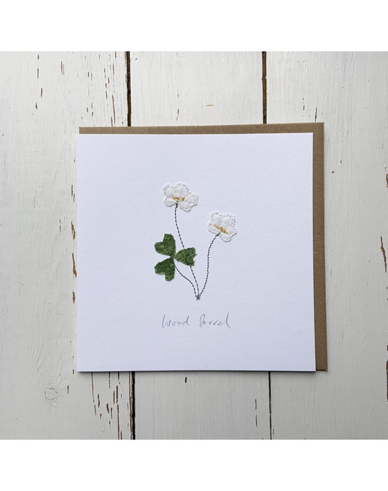 a wildflower notecard stitched directly onto a card blank using free motion machine embroidery and appliqué stitched by textile artist Sarah Becvar