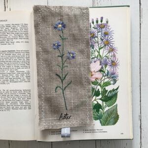 freehand machine embroidered linen flower freehand machine embroidered linen bookmark designed and stitched by textile artist sarah Becvar unique and handmade