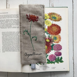 chrystanthemum freehand machine embroidered linen bookmark designed and stitched by textile artist sarah Becvar unique and handmade