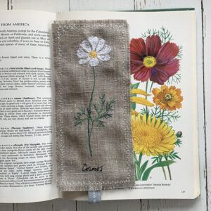 freehand machine embroidered linen flower freehand machine embroidered linen bookmark designed and stitched by textile artist sarah Becvar unique and handmade
