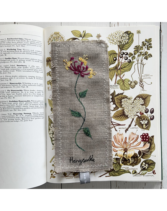 freehand machine embroidered linen flower freehand machine embroidered linen bookmark designed and stitched by textile artist sarah Becvar unique and handmade