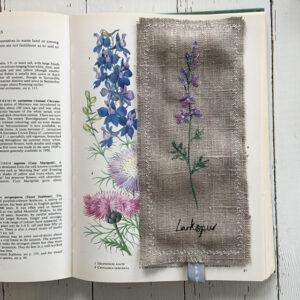 freehand machine embroidered linen flower freehand machine embroidered linen bookmark designed and stitched by textile artist sarah Becvar unique and handmade