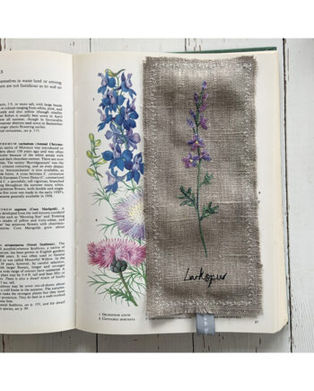 freehand machine embroidered linen flower freehand machine embroidered linen bookmark designed and stitched by textile artist sarah Becvar unique and handmade