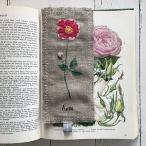 freehand machine embroidered linen flower freehand machine embroidered linen bookmark designed and stitched by textile artist sarah Becvar unique and handmade
