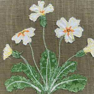 freehand machine embroidered flower hoop with applique embroidery by sarah becvar