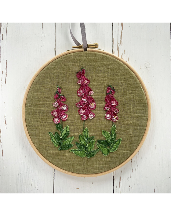 freehand machine embroidered flower hoop with applique embroidery by sarah becvar