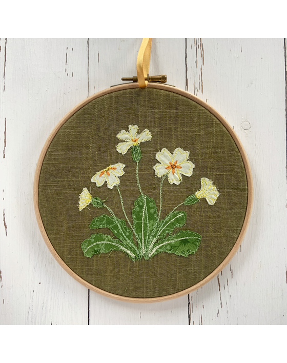 freehand machine embroidered flower hoop with applique embroidery by sarah becvar