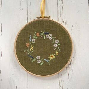freehand machine embroidered flower hoop with applique embroidery by sarah becvar