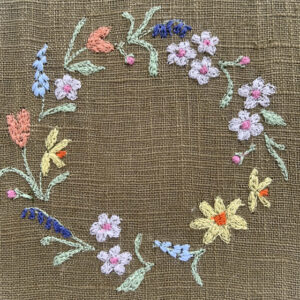 freehand machine embroidered flower hoop with applique embroidery by sarah becvar