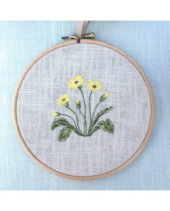 freehand machine embroidered primrose hoop by textile artist sarah becvar