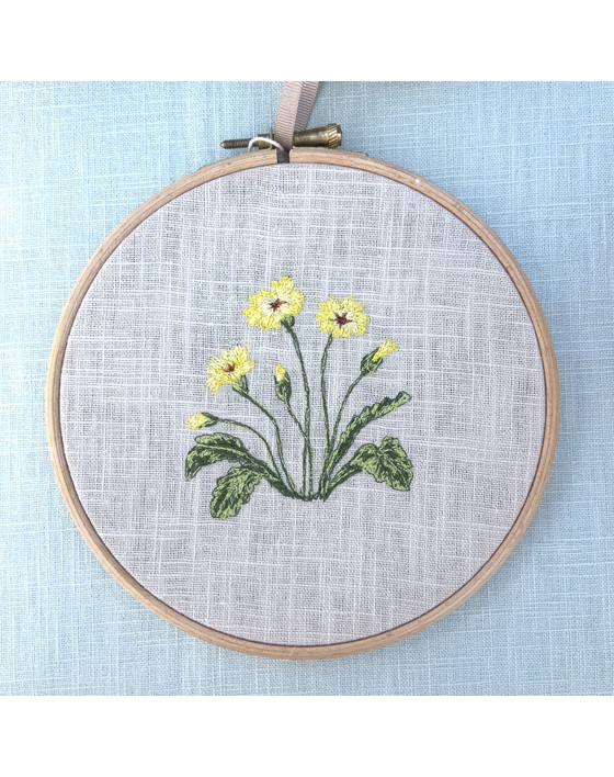 freehand machine embroidered primrose hoop by textile artist sarah becvar