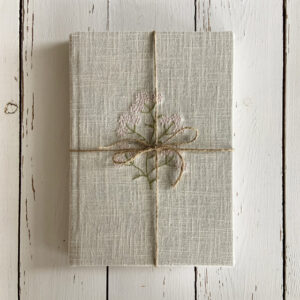 linen bound notebook with freehand machine embroidery by sarah becvar