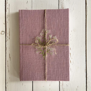 linen bound notebook with freehand machine embroidery by sarah becvar