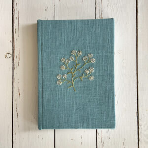 linen bound notebook with freehand machine embroidery by sarah becvar
