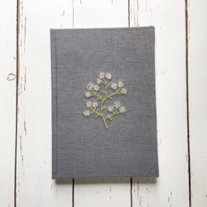 linen bound notebook with freehand machine embroidery by sarah becvar