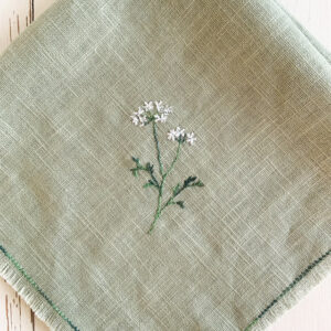 freehand machine embroidered linen napkin with herbs embroidered by sarah becvar
