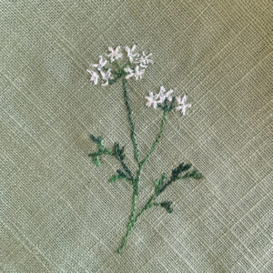 freehand machine embroidered linen napkin with herbs embroidered by sarah becvar