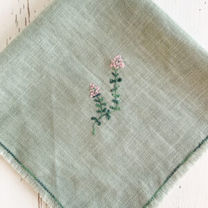 freehand machine embroidered linen napkin with herbs embroidered by sarah becvar