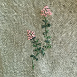 freehand machine embroidered linen napkin with herbs embroidered by sarah becvar