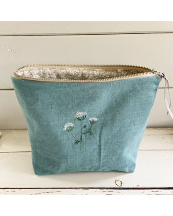 embroidered flower linen pouch by sarah becvar