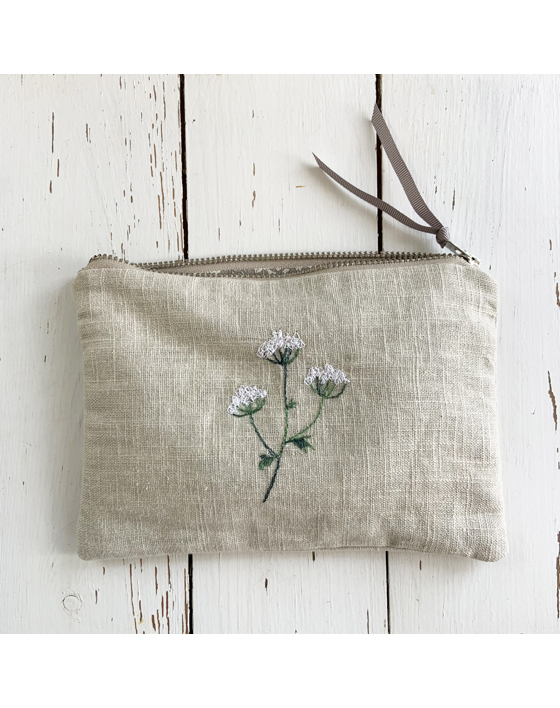 embroidered flower linen pouch by sarah becvar