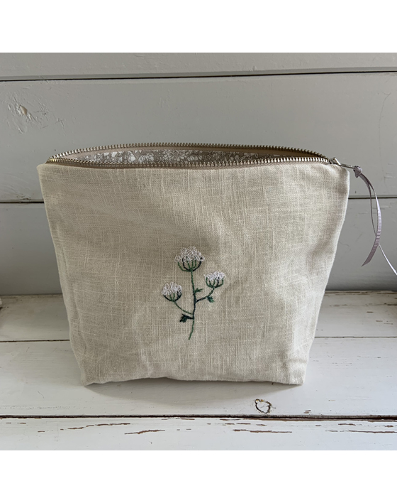 embroidered flower linen pouch by sarah becvar