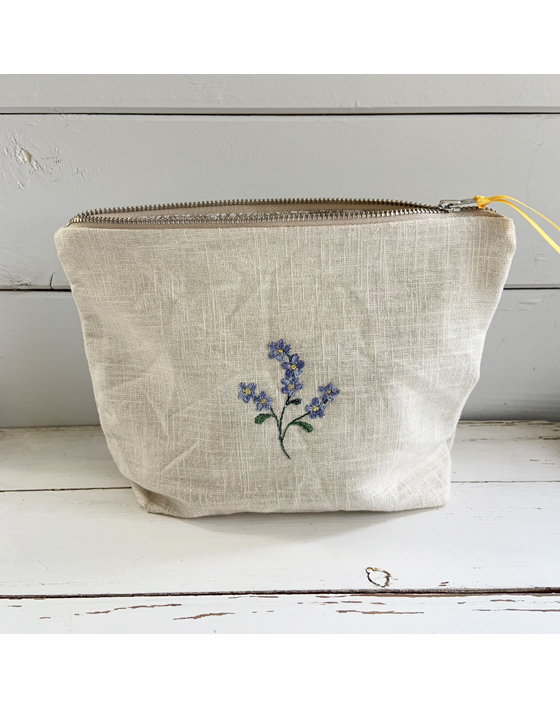 embroidered flower linen pouch by sarah becvar